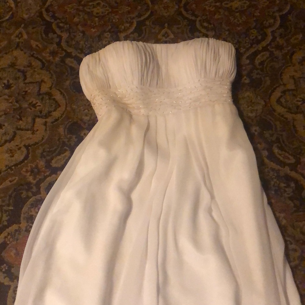 Simple strapless white dress. Worn once for prom!